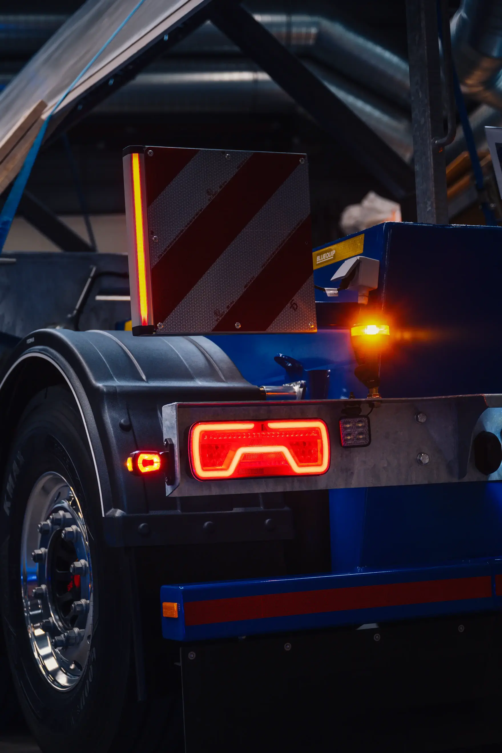 Wide overview of multiple commercial vehicles with full marker- and position-lamp installations