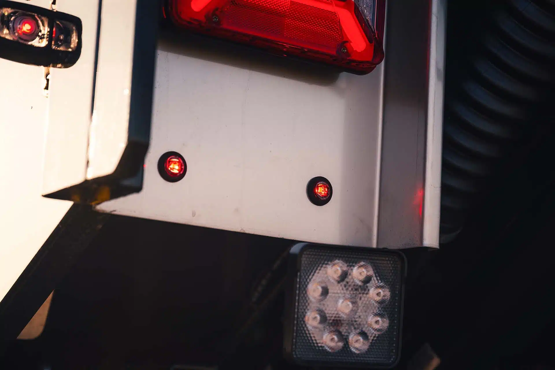 Long-haul truck cab fitted with a full row of side and roof marker lamps for a show line-up